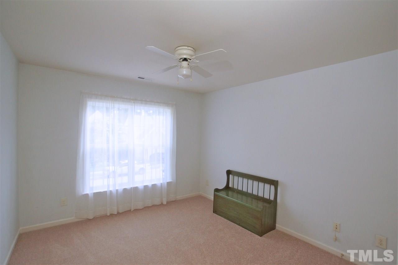 7540 Silver View Lane Raleigh, NC 27613 - Photo 21 of 29 Bedroom on second floor of the home.