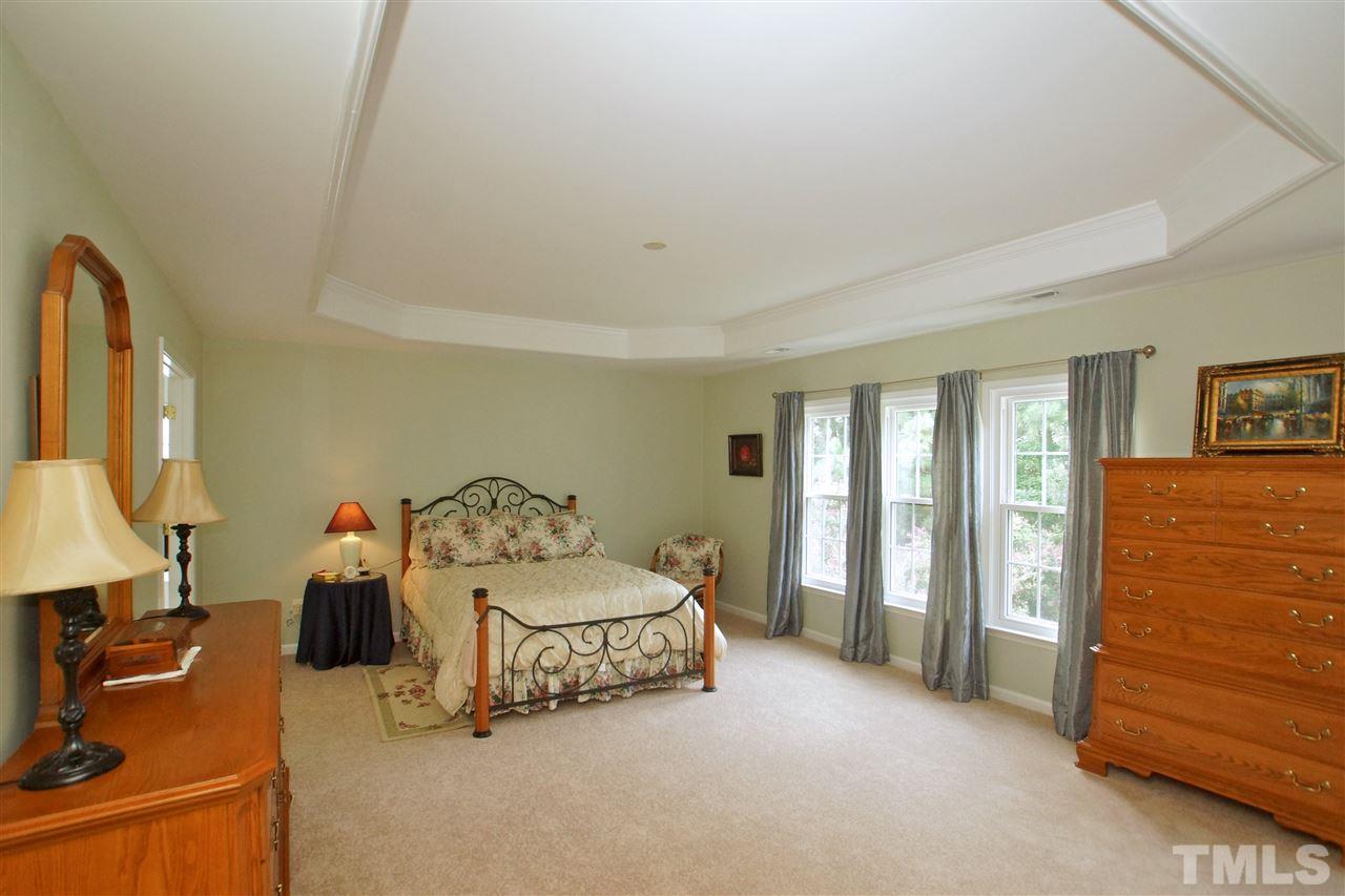 7540 Silver View Lane Raleigh, NC 27613 - Photo 22 of 29 Master suite on the second floor of the home with trey ceiling.