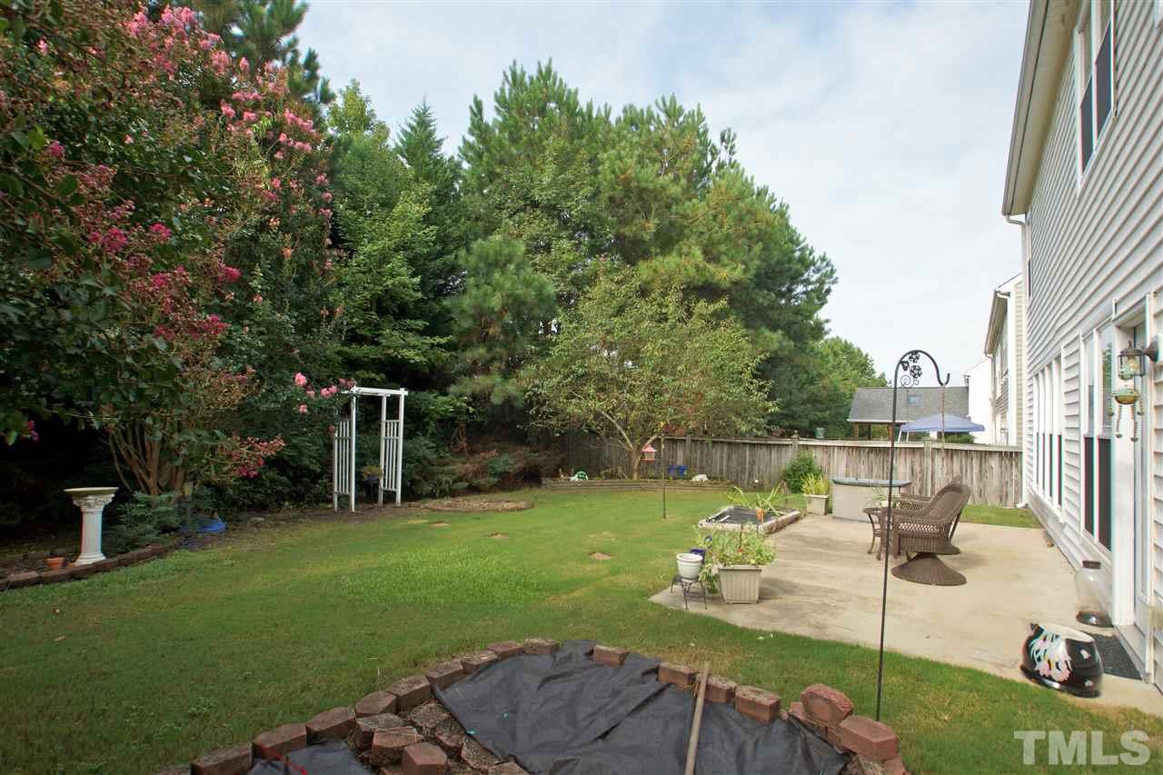 7540 Silver View Lane Raleigh, NC 27613 - Photo 27 of 29 Back yard complete with patio for a home stay-cation.