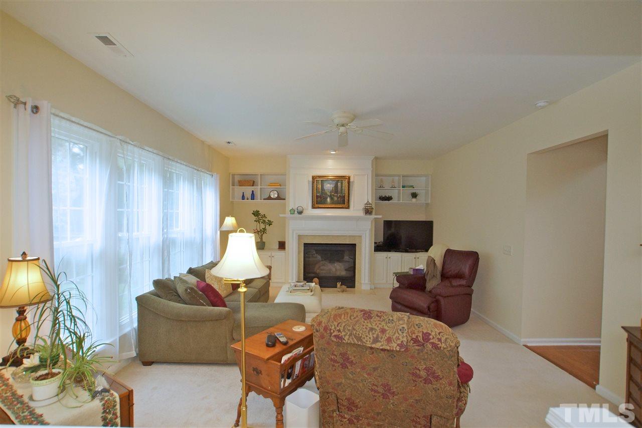 7540 Silver View Lane Raleigh, NC 27613 - Photo 8 of 29 Ample natural lighting and neutral color palette.