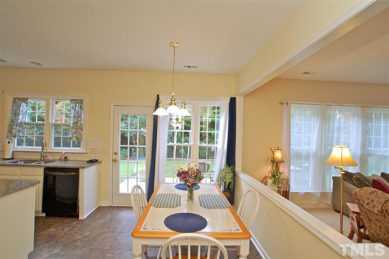 7540 Silver View Lane Raleigh, NC 27613 - Photo 10 of 29 Eat in kitchen separate from dining room and access to back patio.