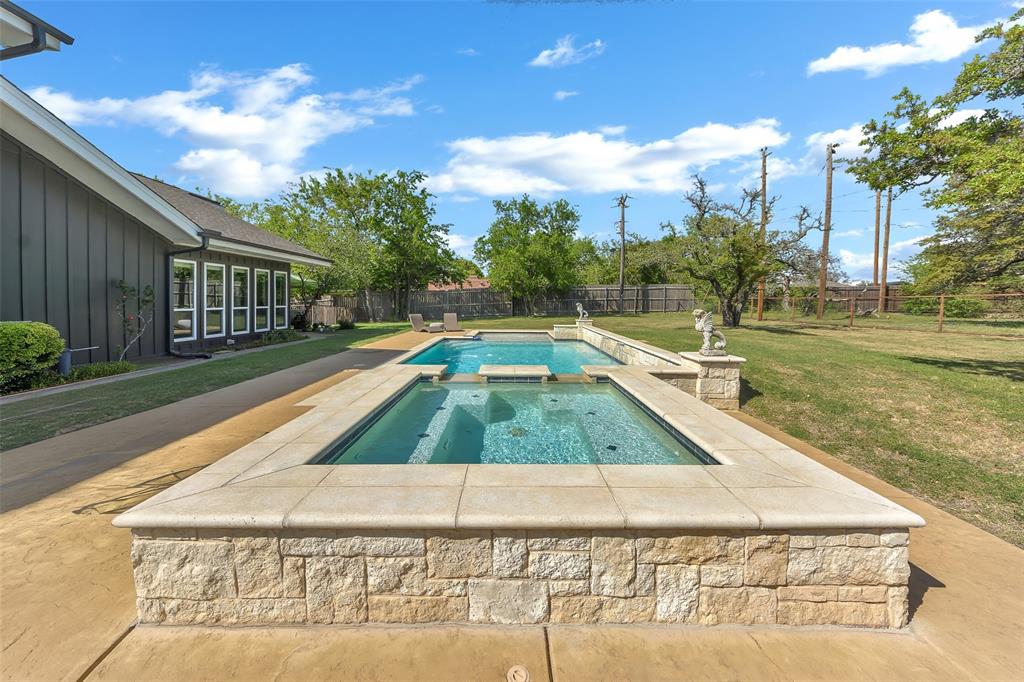 103 Robin Avenue Weatherford, TX 76086 - Photo 30 of 37 a view of swimming pool with a yard
