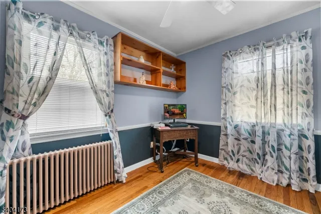 a workspace with furniture and a window