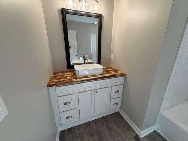 756 Old Summerville Road Northwest Rome, GA 30165 - Photo 11 of 21 a bathroom with a granite countertop sink and a mirror