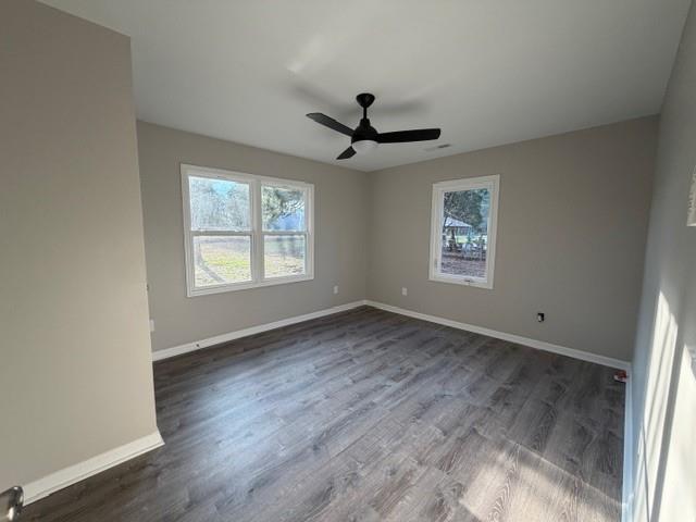 756 Old Summerville Road Northwest Rome, GA 30165 - Photo 16 of 21 a view of an empty room with a window and wooden floor