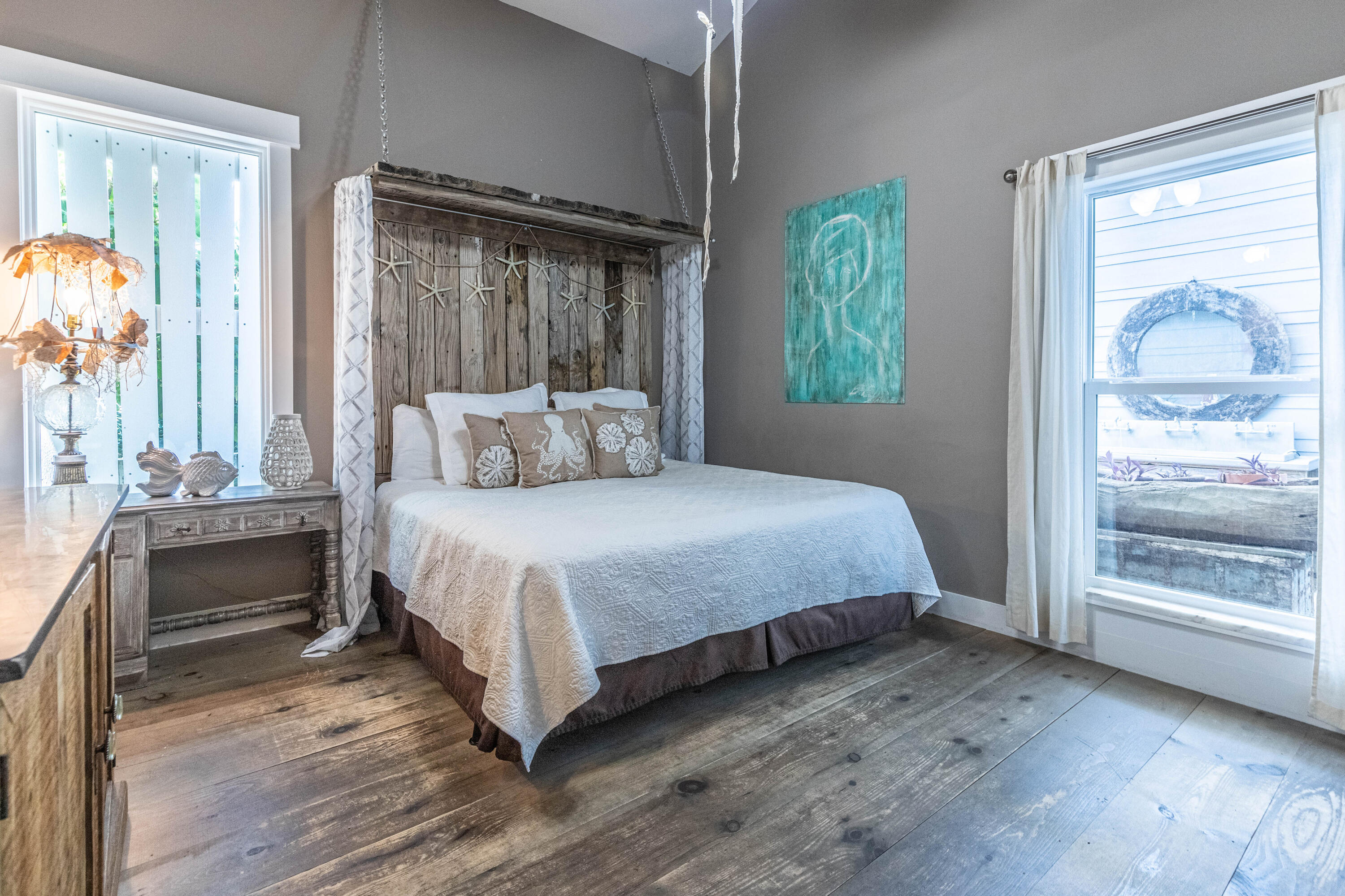 17807 Front Beach Road Panama City Beach, FL 32413 - Photo 11 of 17 a bedroom with a bed and a window