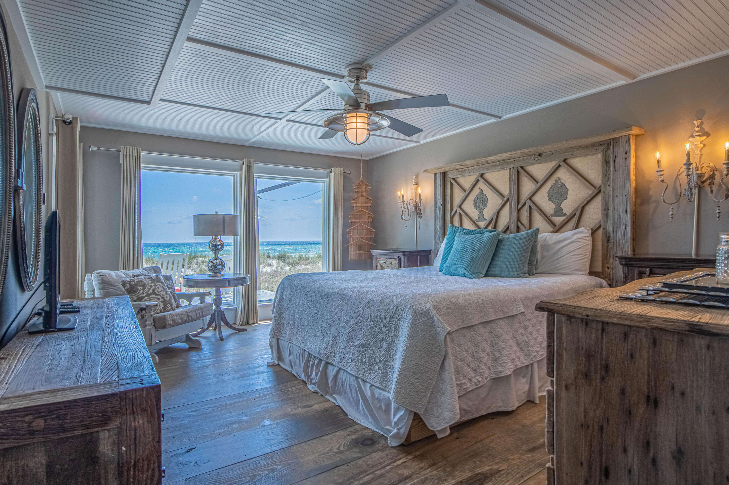 17807 Front Beach Road Panama City Beach, FL 32413 - Photo 9 of 17 a bedroom with a bed a large window with outer view and balcony view