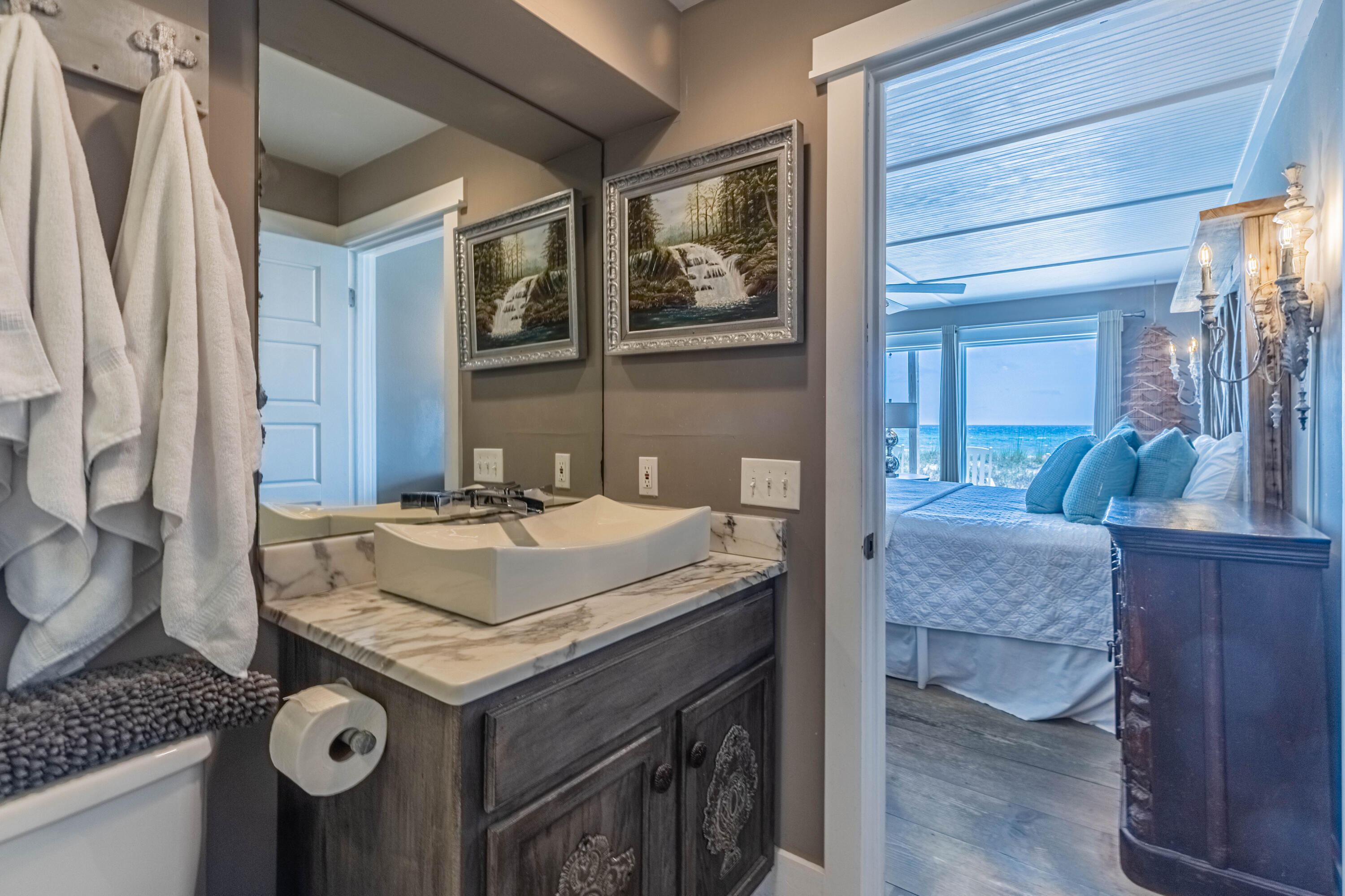 17807 Front Beach Road Panama City Beach, FL 32413 - Photo 10 of 17 a view of kitchen island with granite countertop furniture and a fireplace