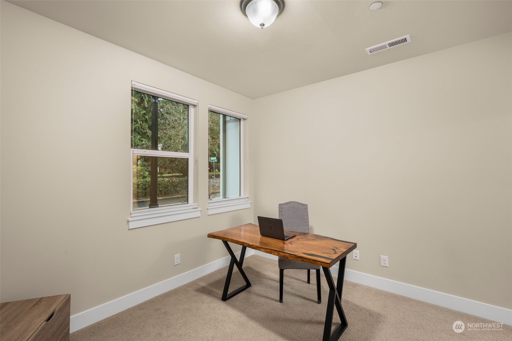 9604 Main Street, Unit B Bothell, WA 98011 - Photo 23 of 34 a work room with furniture and windows