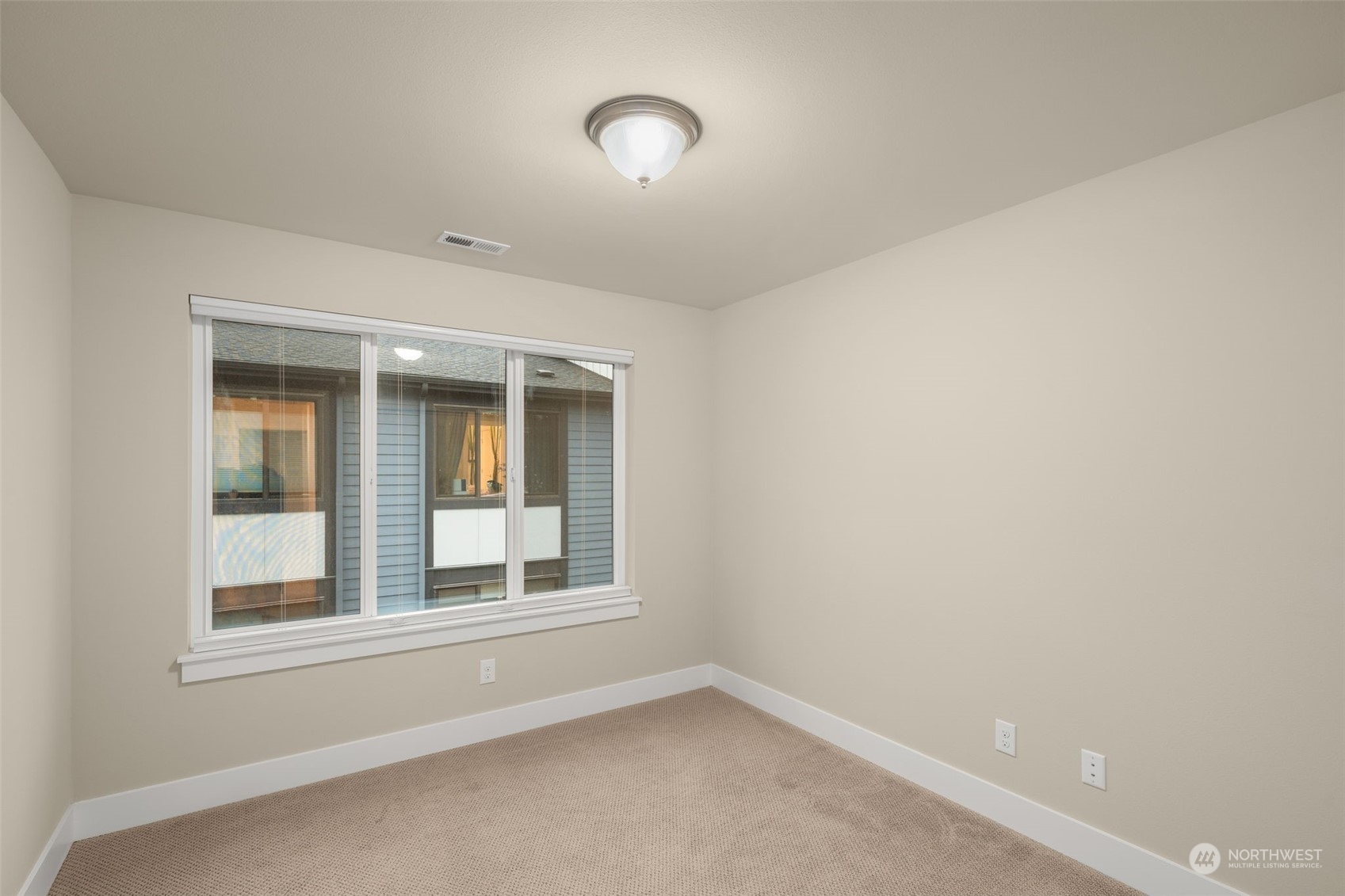 9604 Main Street, Unit B Bothell, WA 98011 - Photo 24 of 34 an empty room with a window