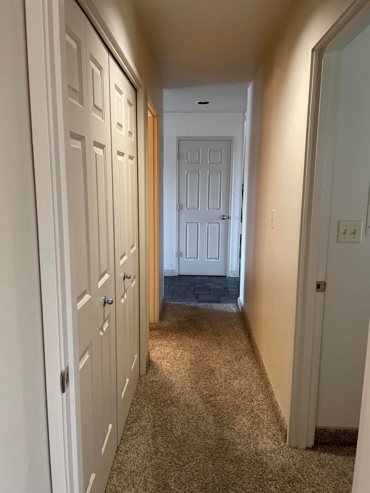 2340 Snowgoose Drive, Unit RV9D Redmond, OR 97756 - Photo 30 of 33 hallway to bedrooms 1 & 2 and w/d closet