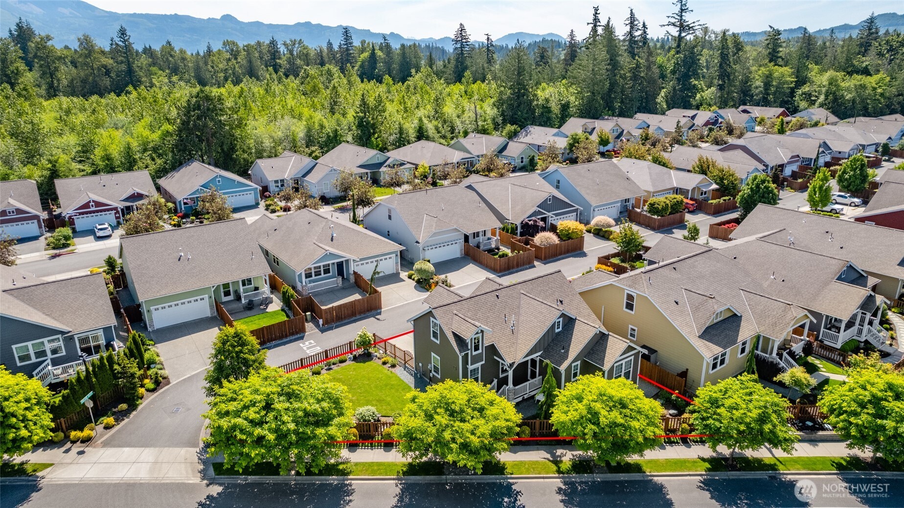 232 Sinclair Alley Mount Vernon, WA 98274 - Photo 2 of 33 an aerial view of a house with lots of trees