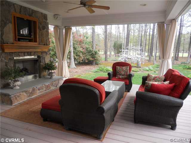 2551 Kentford Road Midlothian, VA 23113 - Photo 4 of 12 a living room with furniture and a fireplace