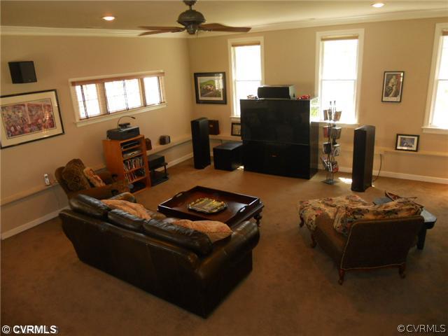 2551 Kentford Road Midlothian, VA 23113 - Photo 9 of 12 a living room with furniture and a flat screen tv