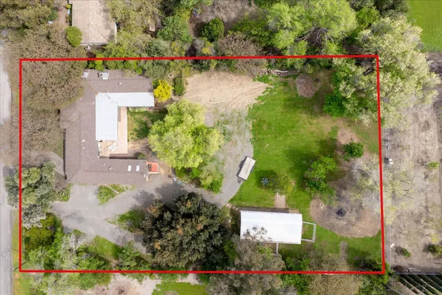 a large bathroom with a double vanity sink mirror and bathtub