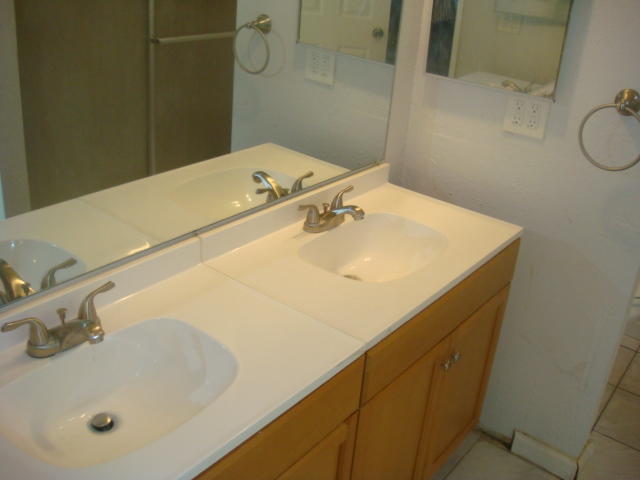 67235 Verona Road Cathedral City, CA 92234 - Photo 7 of 14 a bathroom with a sink and a mirror