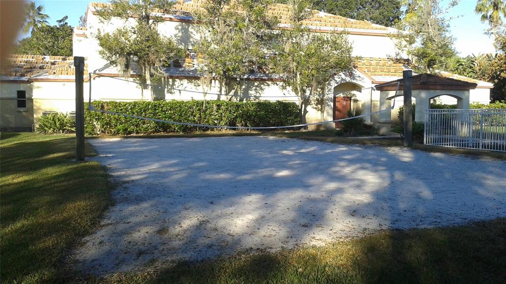829 Camargo Way, Unit 203 Altamonte Springs, FL 32714 - Photo 7 of 26 a view of a street with a tree in the background