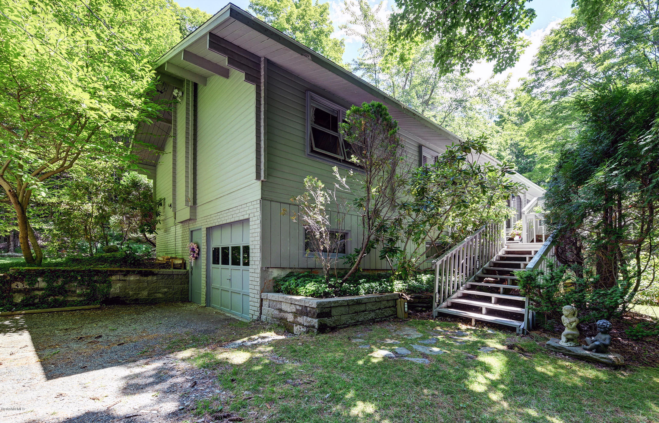 2399 Swamp Road Richmond, MA 01254 - Photo 2 of 36 a view of a house with a yard plants and a patio