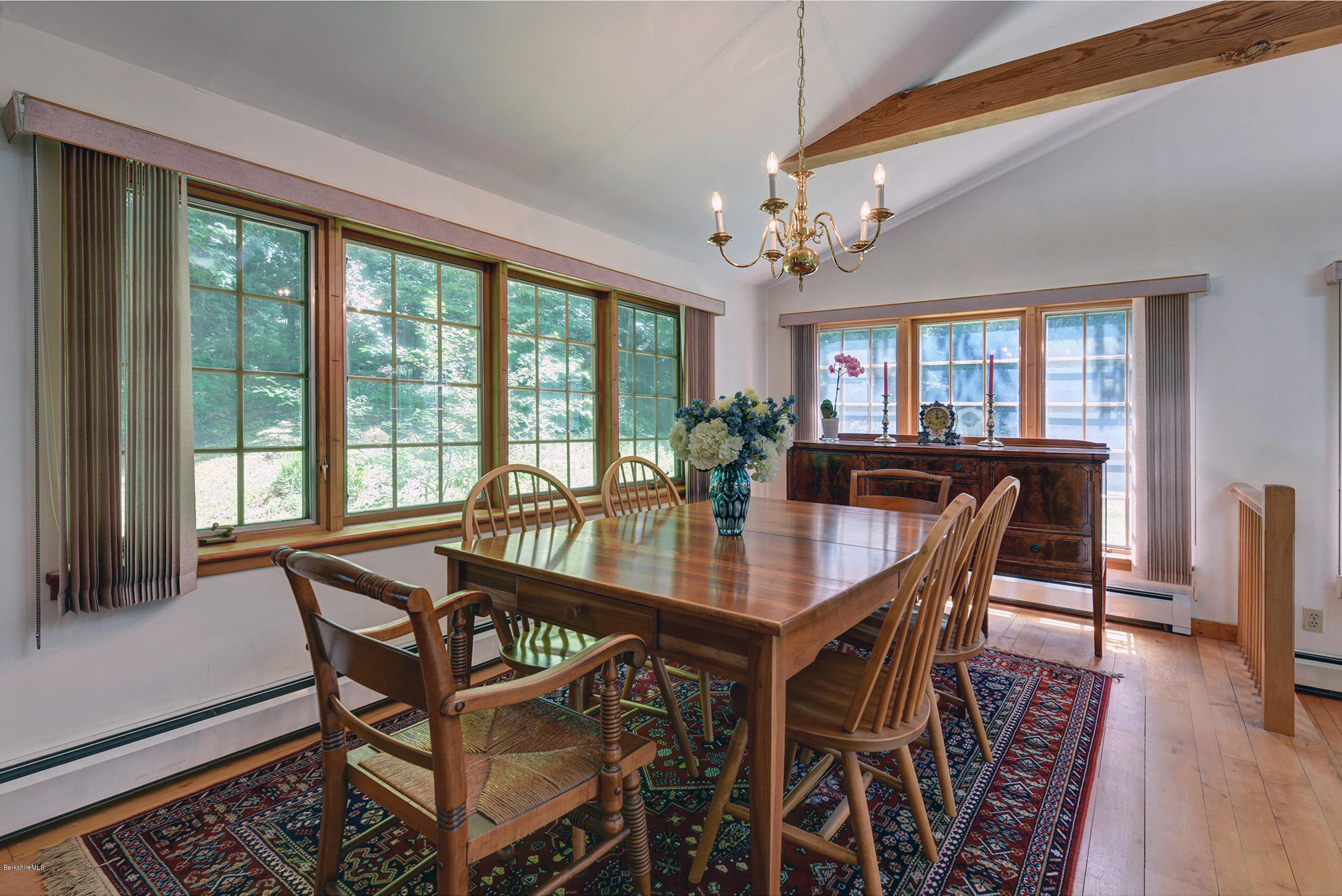 2399 Swamp Road Richmond, MA 01254 - Photo 11 of 36 a view of a dining room with furniture window and wooden floor