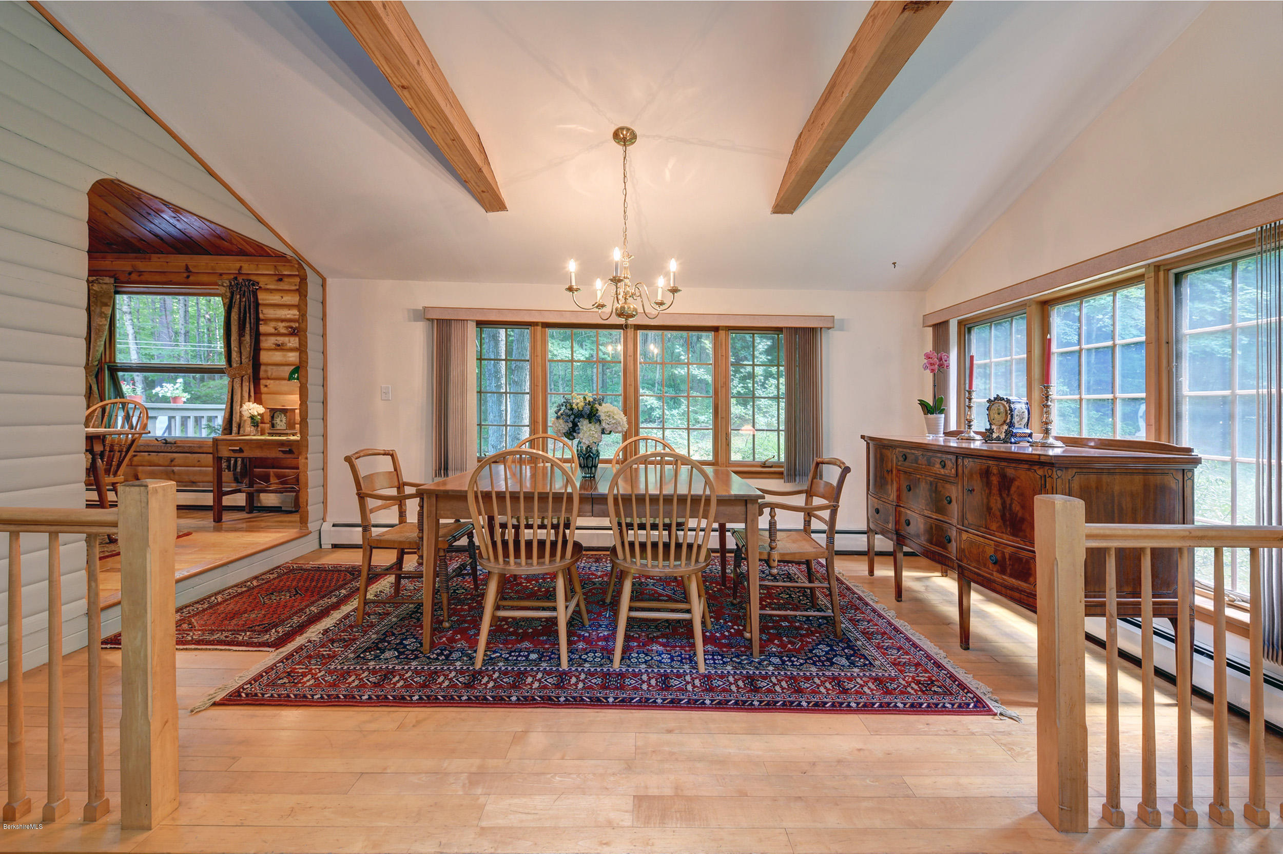 2399 Swamp Road Richmond, MA 01254 - Photo 12 of 36 a view of a dining room with furniture window and wooden floor