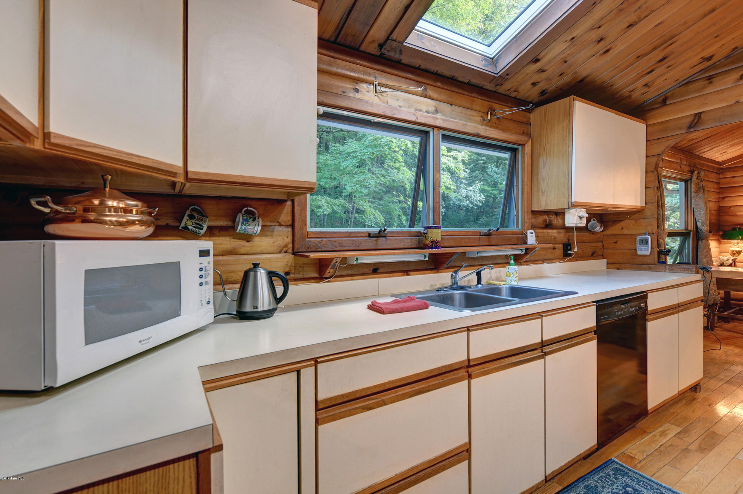 2399 Swamp Road Richmond, MA 01254 - Photo 14 of 36 a kitchen with sink a stove and a microwave