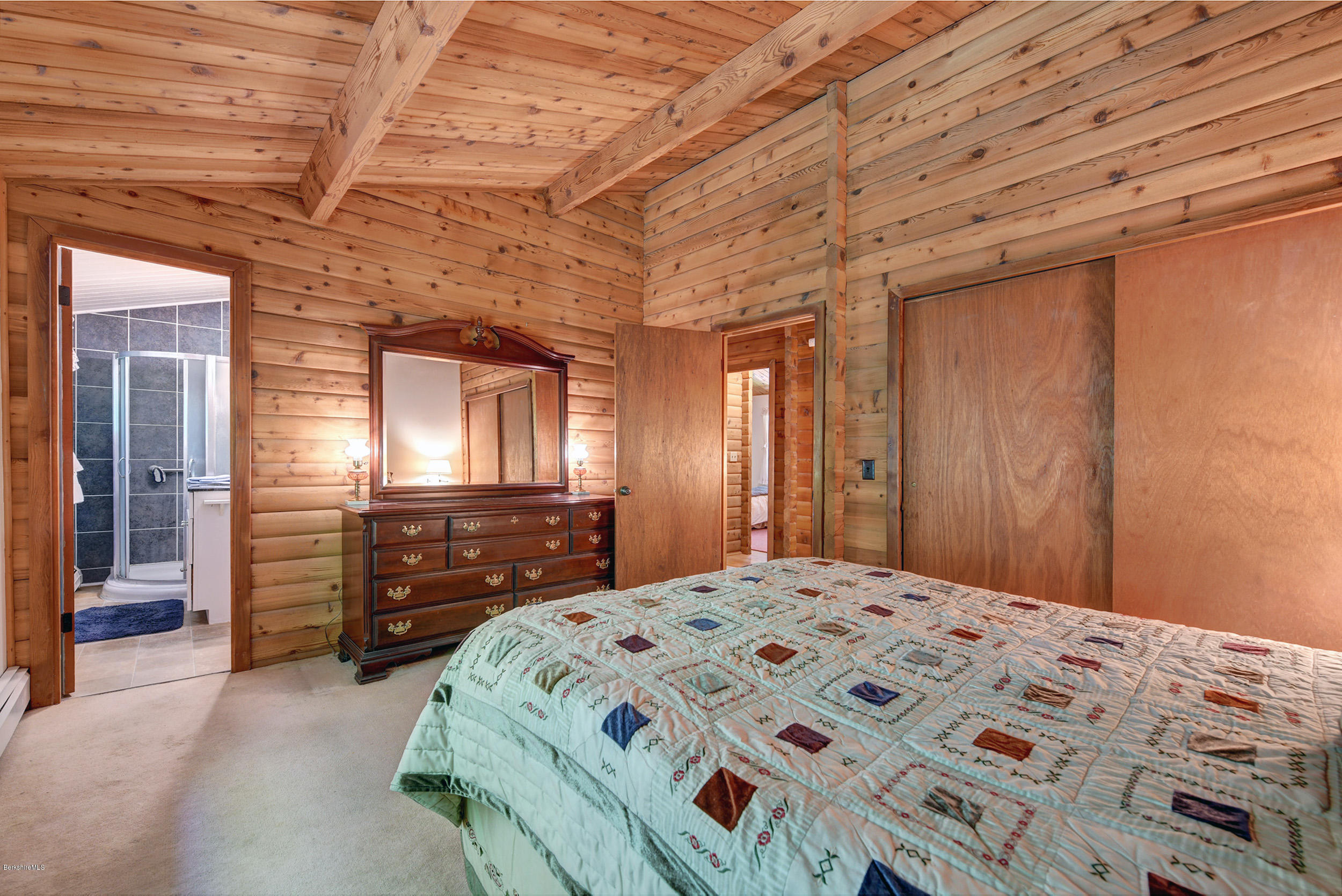 2399 Swamp Road Richmond, MA 01254 - Photo 19 of 36 a bedroom with a bed and a dresser