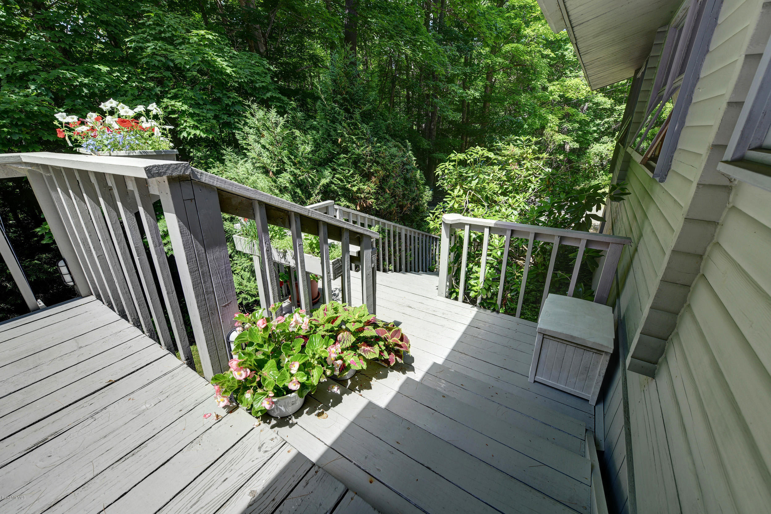 2399 Swamp Road Richmond, MA 01254 - Photo 3 of 36 a view of balcony with wooden floor and seating space