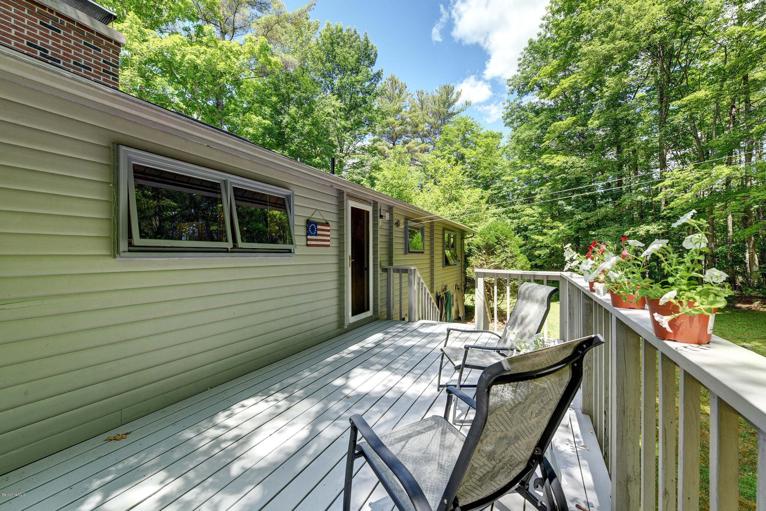 2399 Swamp Road Richmond, MA 01254 - Photo 32 of 36 a view of backyard with outdoor seating and stairs