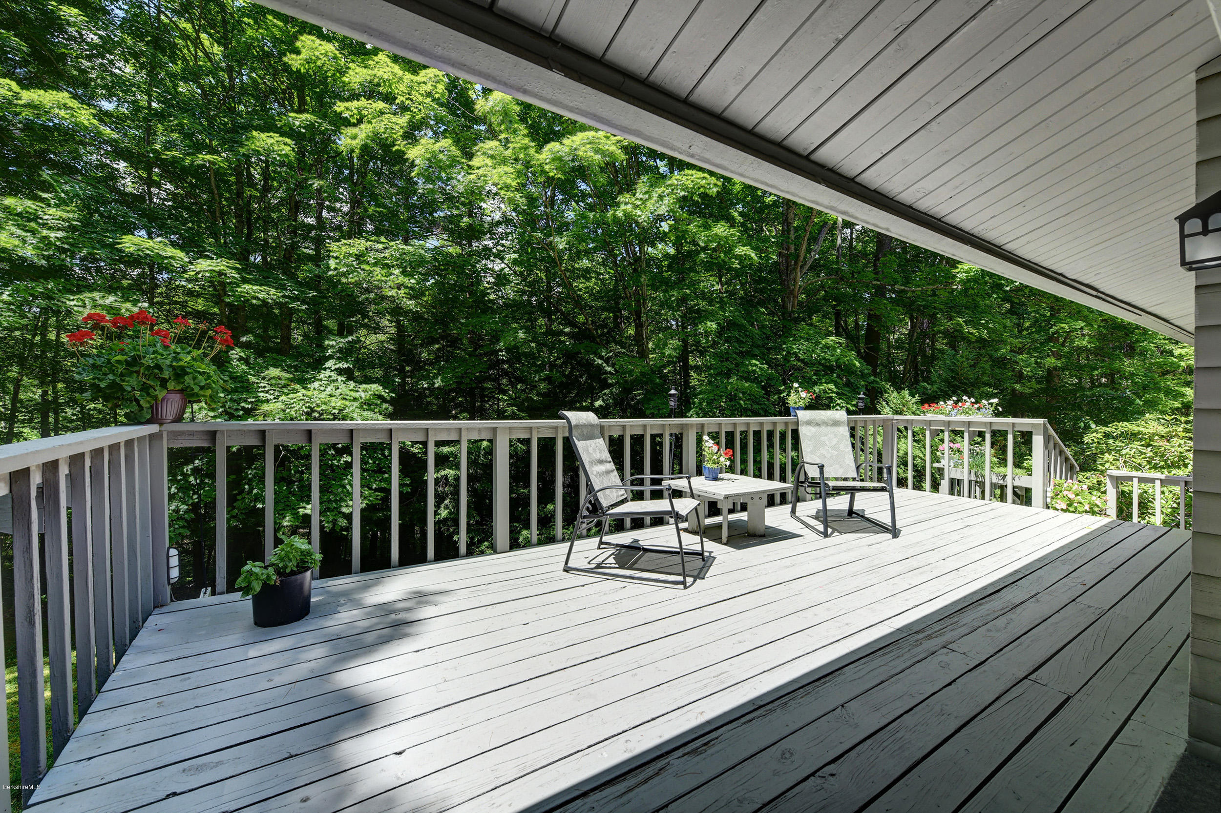 2399 Swamp Road Richmond, MA 01254 - Photo 5 of 36 a view of deck with furniture and trees around