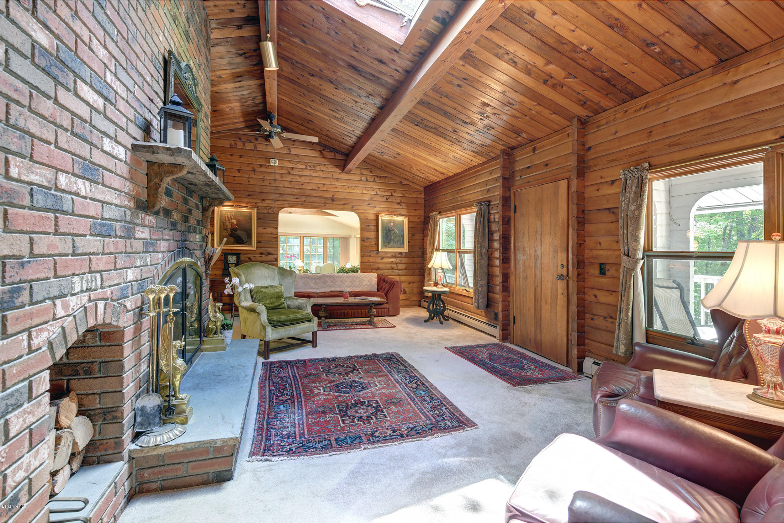 2399 Swamp Road Richmond, MA 01254 - Photo 7 of 36 a living room with furniture and a fireplace