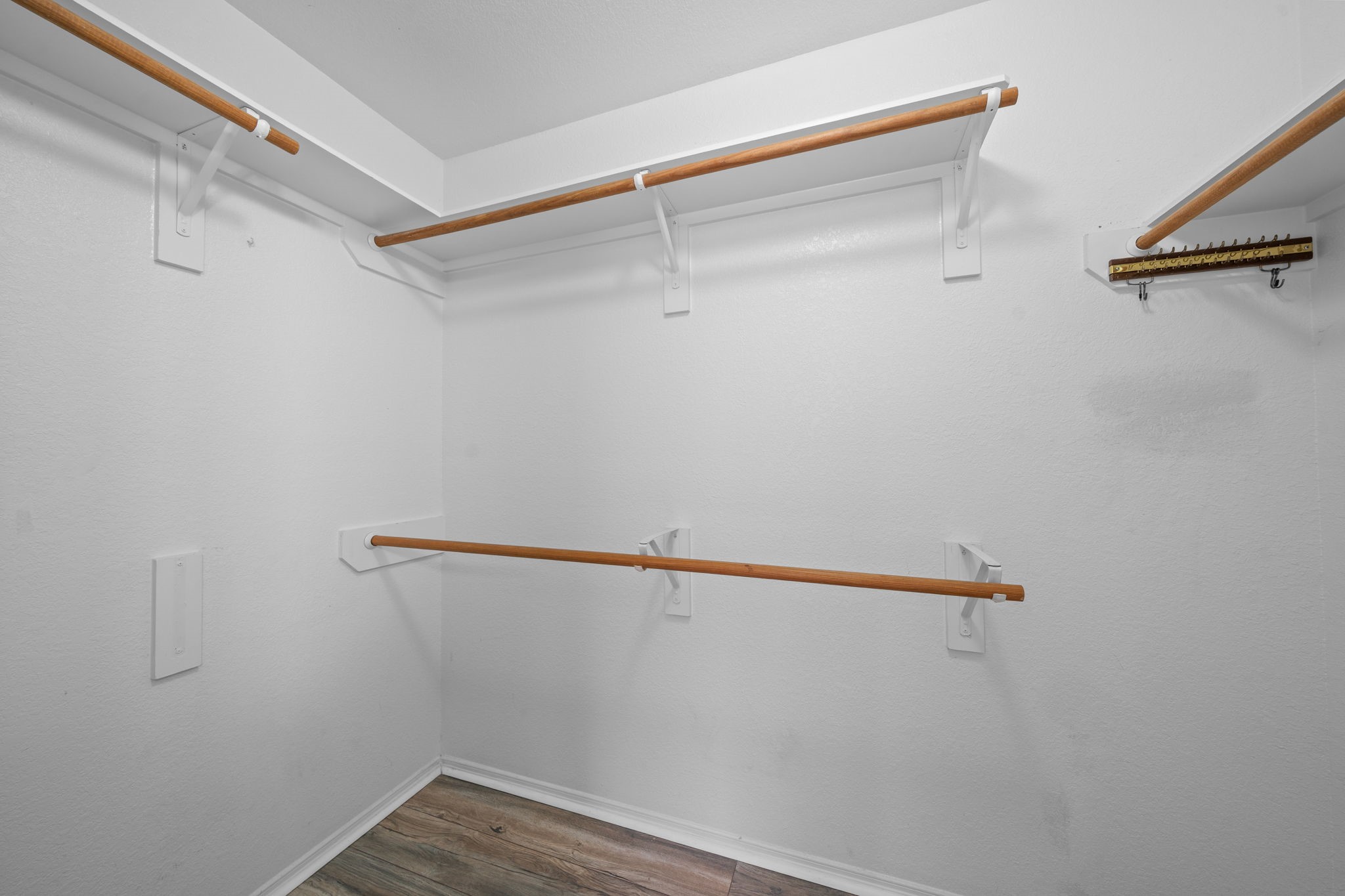 694 St Croix Alvin, TX 77511 - Photo 17 of 30 a view of a room with racks on the wall