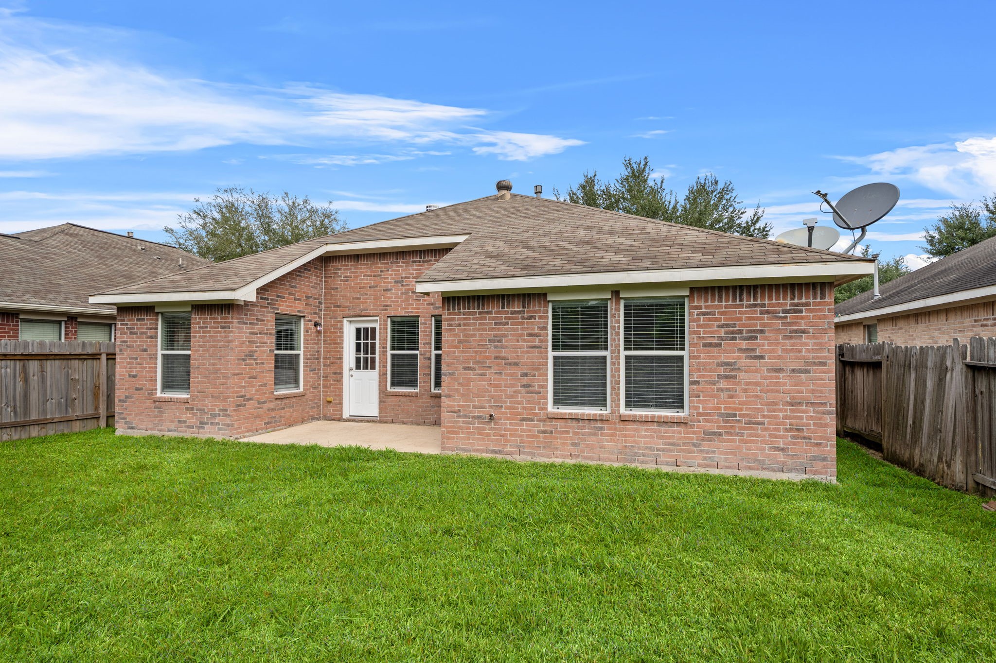 694 St Croix Alvin, TX 77511 - Photo 24 of 30 a front view of house with yard and green space