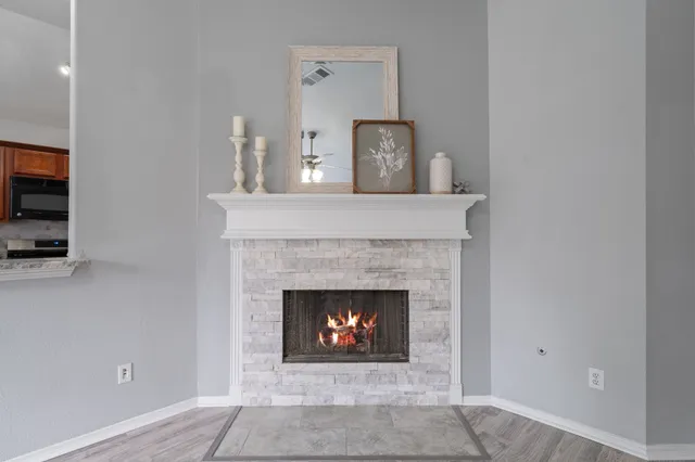 a living room with a fireplace