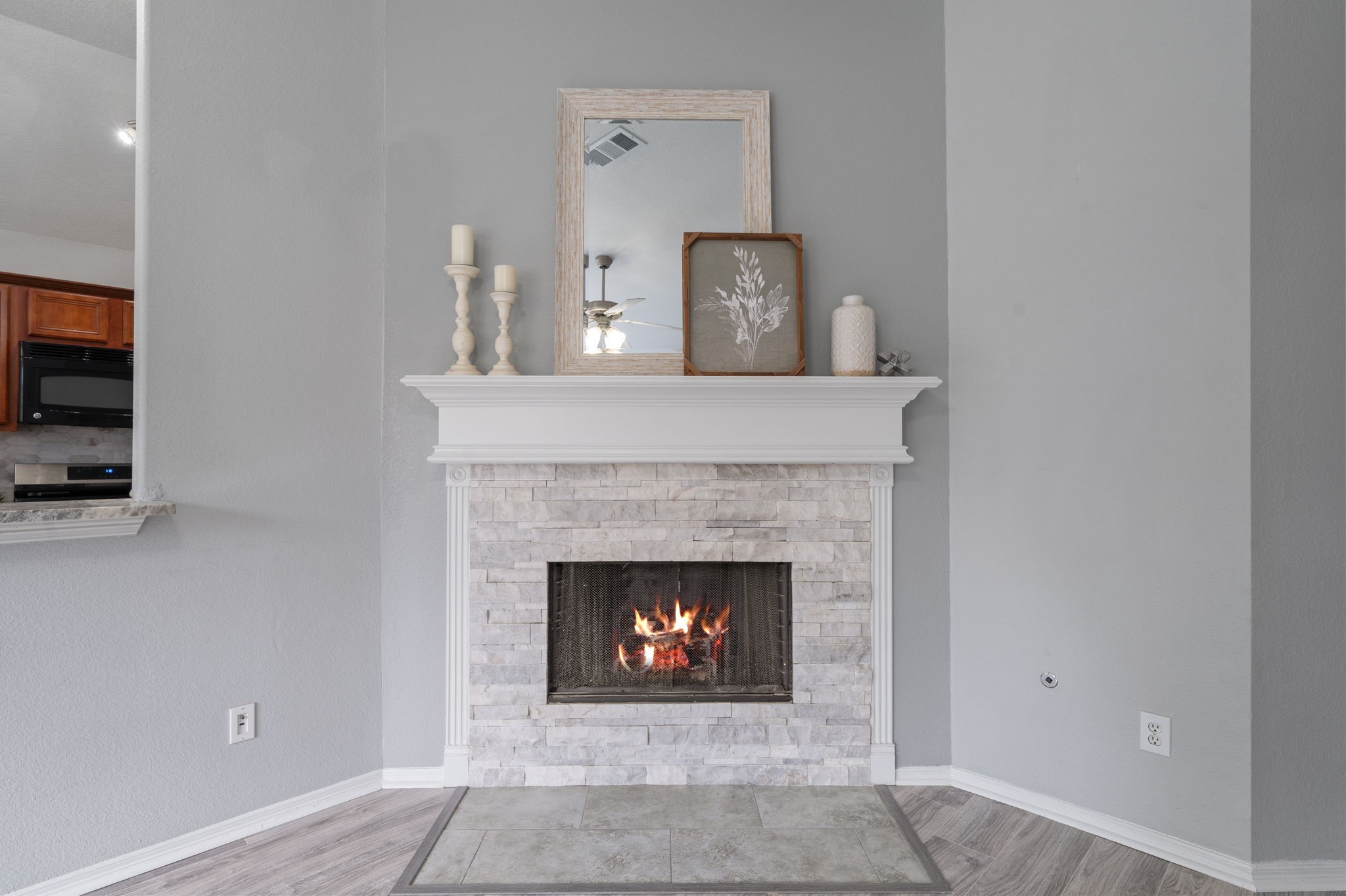 694 St Croix Alvin, TX 77511 - Photo 4 of 30 a living room with a fireplace