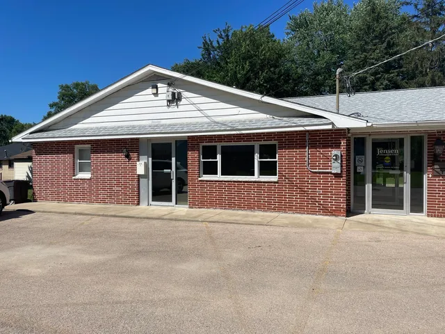 a front view of a house with yard