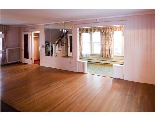 42 Norway Road Bangor, ME 04401 - Photo 3 of 25 Living Room. Enclosed heated sunroom...