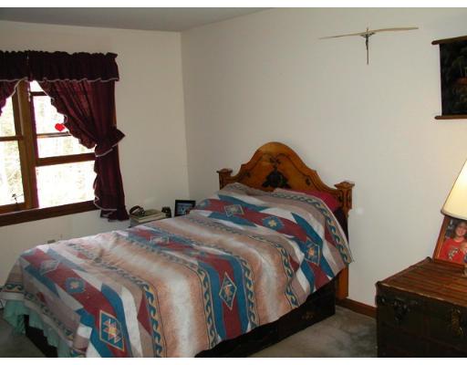 104 Ferin Road Ashburnham, MA 01430 - Photo 14 of 16 a bedroom with a bed and a window