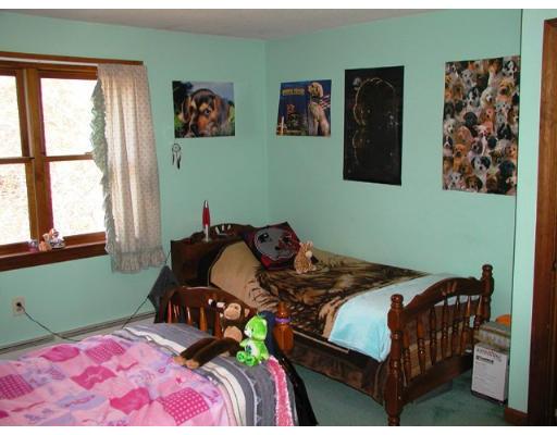 104 Ferin Road Ashburnham, MA 01430 - Photo 16 of 16 a bedroom with two beds and a window
