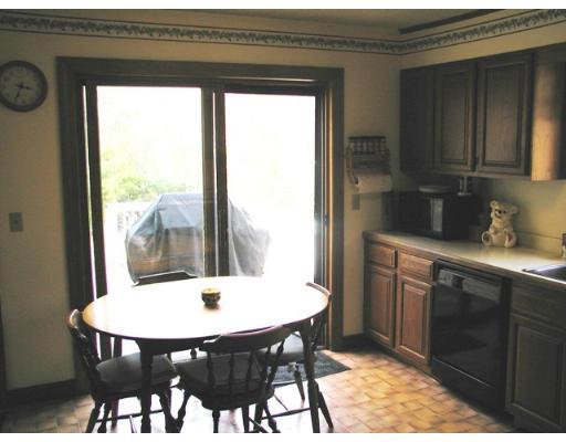 104 Ferin Road Ashburnham, MA 01430 - Photo 8 of 16 a view of a dining room with furniture window and wooden floor