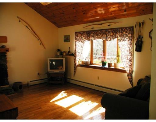 104 Ferin Road Ashburnham, MA 01430 - Photo 10 of 16 a view of a living room with a large window