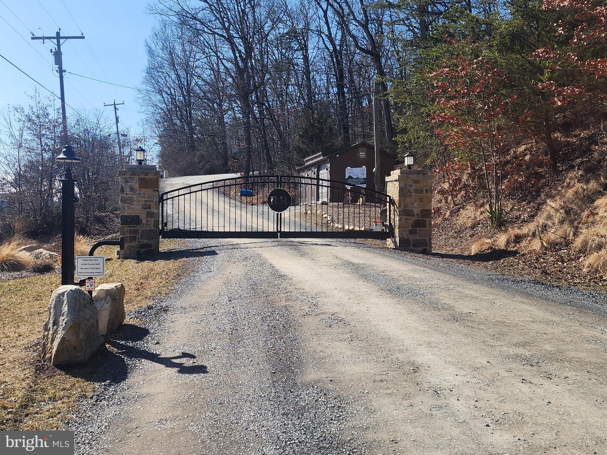 116 River Ridge Yellow Spring, WV 26865 - Photo 33 of 41 a view of street with wooden fence