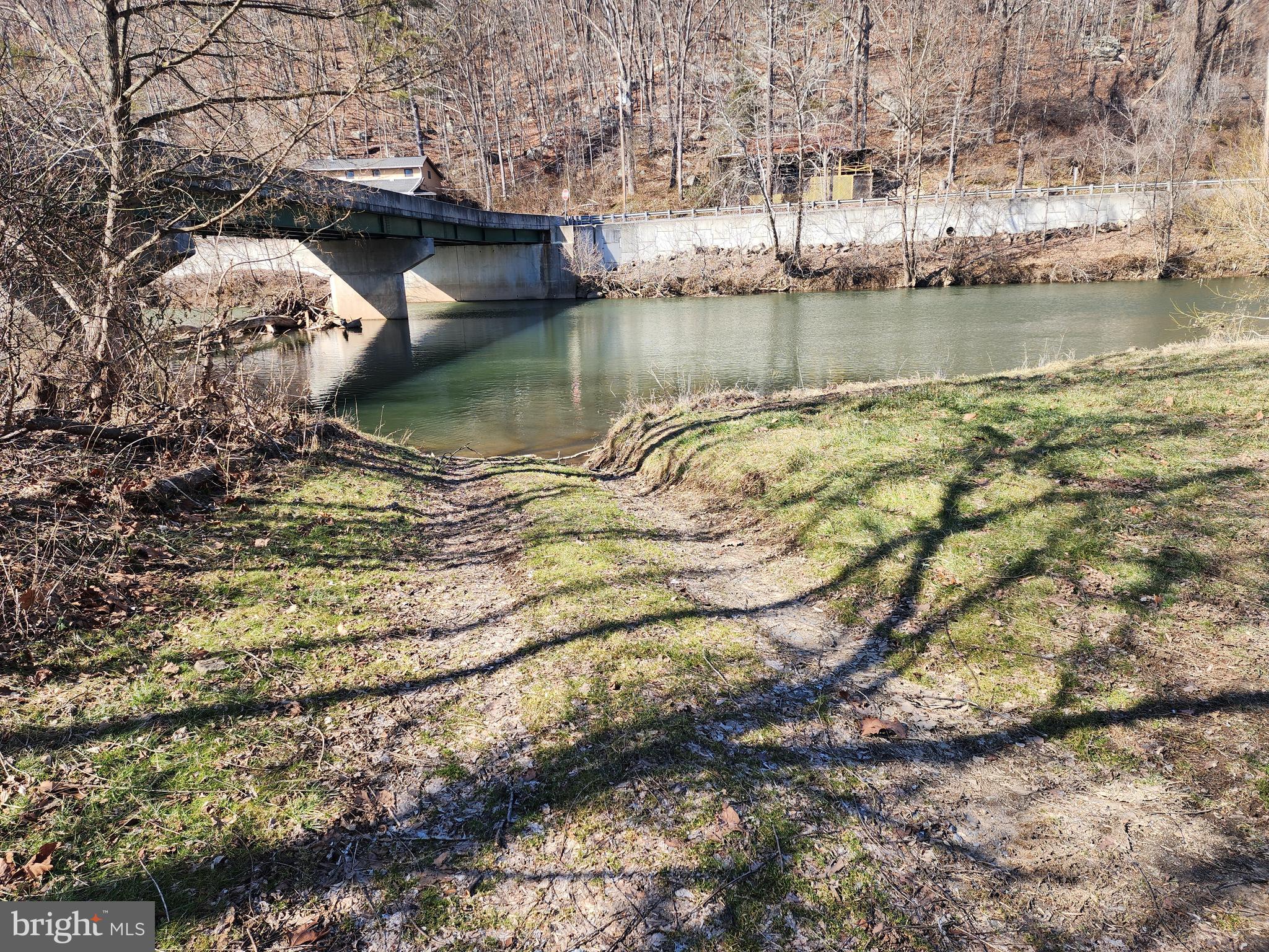 116 River Ridge Yellow Spring, WV 26865 - Photo 37 of 41 a view of a lake in middle of forest