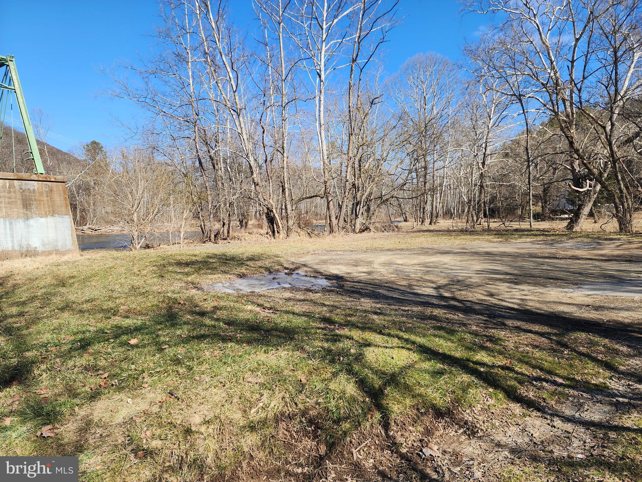 116 River Ridge Yellow Spring, WV 26865 - Photo 39 of 41 a view of dirt yard with large trees