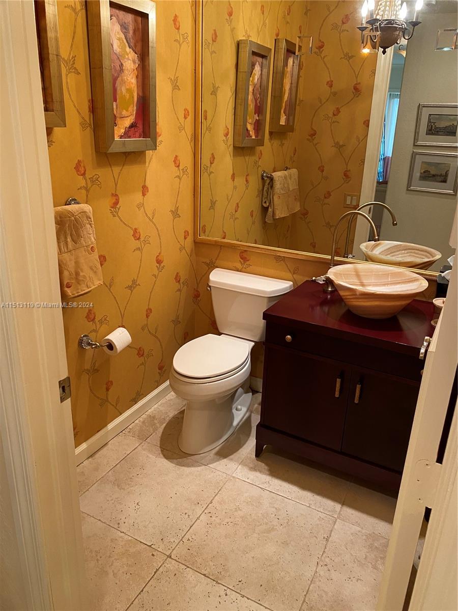 Boca West Boca Raton, FL 33434 - Photo 11 of 28 a bathroom with a sink toilet and shower