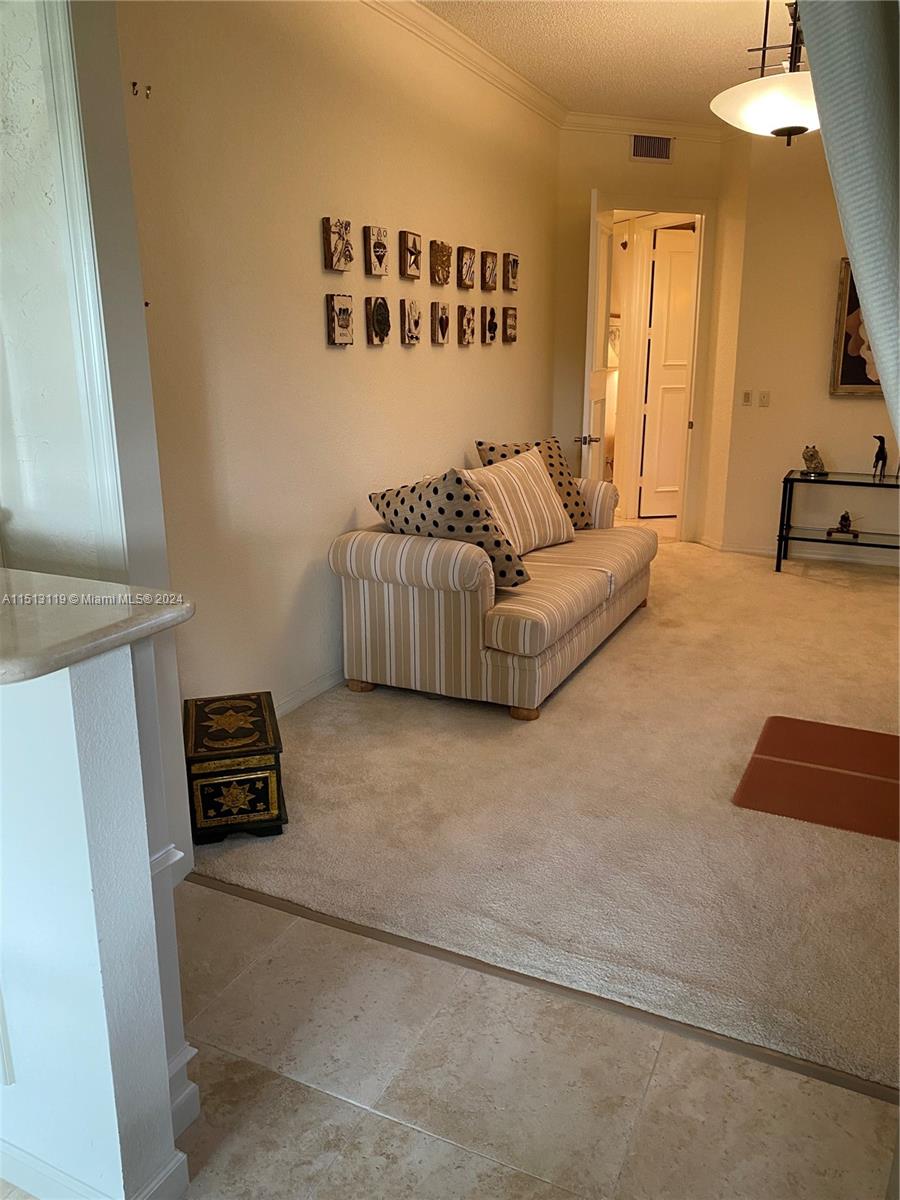 Boca West Boca Raton, FL 33434 - Photo 12 of 28 a bedroom with furniture and a window