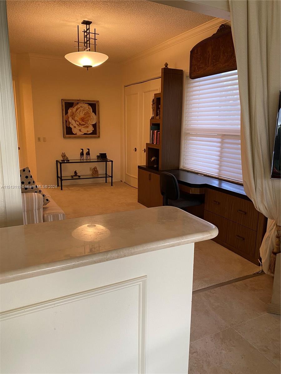 Boca West Boca Raton, FL 33434 - Photo 13 of 28 a room with furniture and a flat screen tv