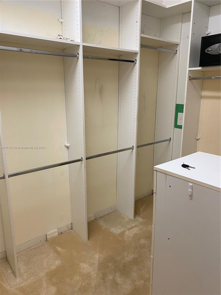 Boca West Boca Raton, FL 33434 - Photo 15 of 28 a utility room with dryer and washer