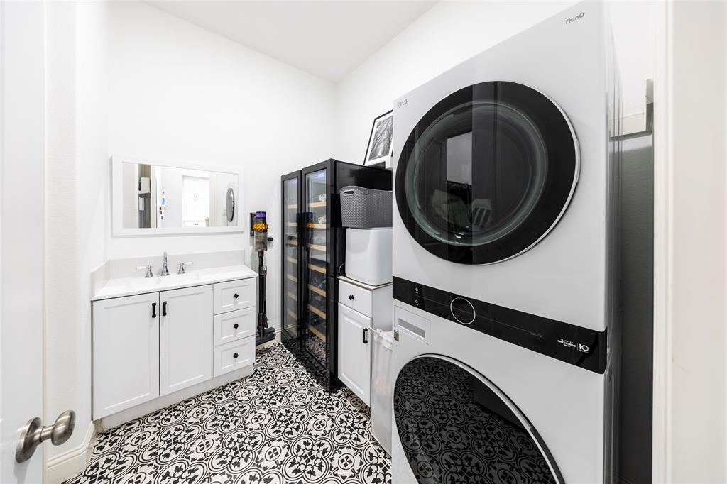1650 Oakcrest Drive Prosper, TX 75078 - Photo 32 of 40 Washroom featuring stacked washer / drying machine and beverage cooler
