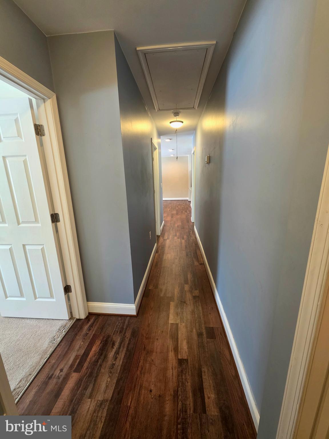 1342 Edna Road Pasadena, MD 21122 - Photo 15 of 31 a view of hallway with wooden floor