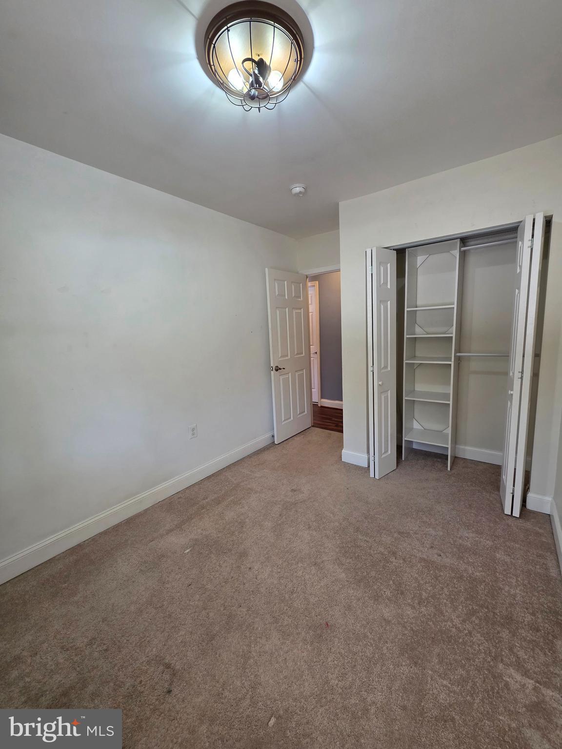 1342 Edna Road Pasadena, MD 21122 - Photo 20 of 31 an empty room with a empty space and a large window